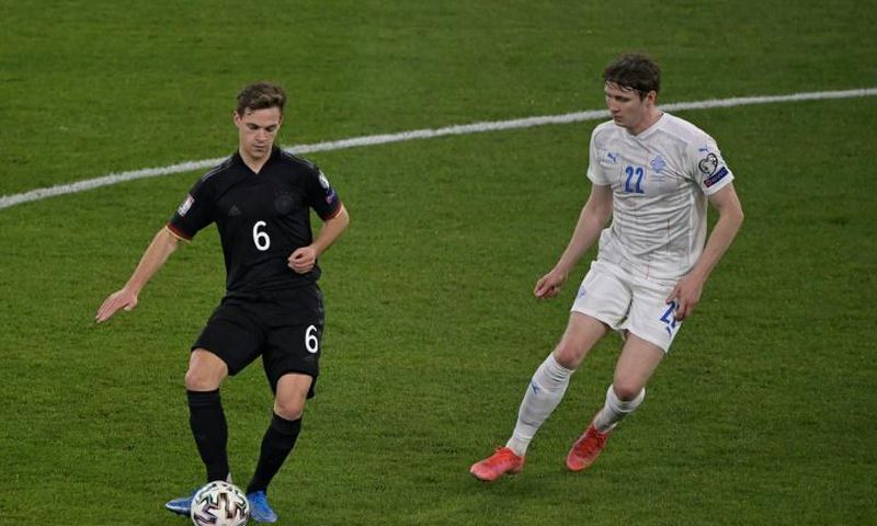 Joshua Kimmich (L) helped create both of Germany's first-half goals against  Iceland