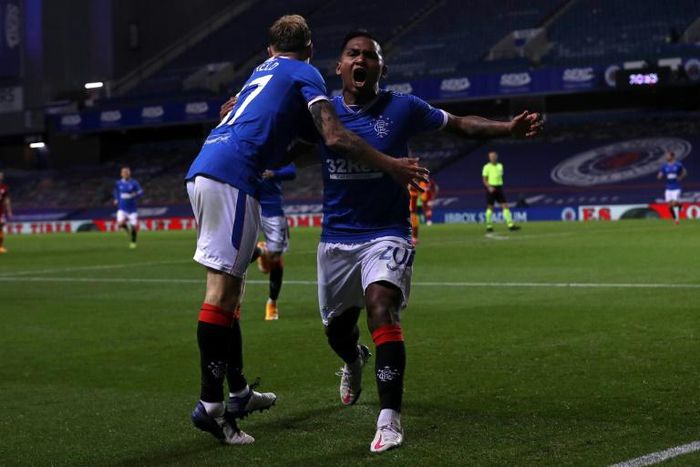 Alfredo Morelos (right)was on target as Rangers thrashed Dundee United 4-1