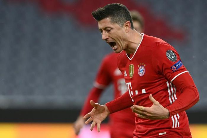 Robert Lewandowski celebrates converting Bayern Munich's first-half penalty against Lazio on Wednesday