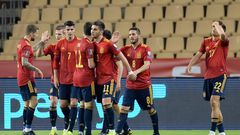 On target: Spain's players celebrate Ferran Torres' goal