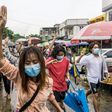 Protesters make the three-finger salute during a demonstration against the military coup in Yangon earlier this month