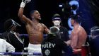 Anthony Joshua and Kubrat Pulev (Reuters)