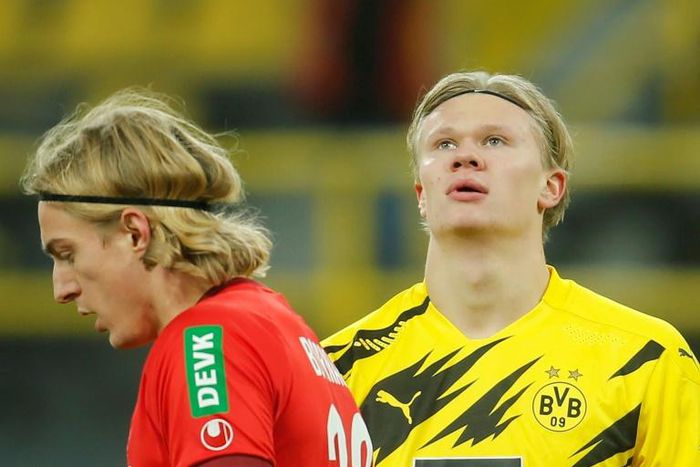 Borussia Dortmund striker Erling Braut Haaland (R) was ruled out of Wednesday's home match against Lazio