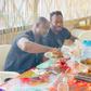 Fans in awe of Essien and Appiah as ex-Black Stars duo feast in chop bar