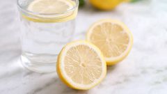 lemon inside a glass of water [fitnessjockey]