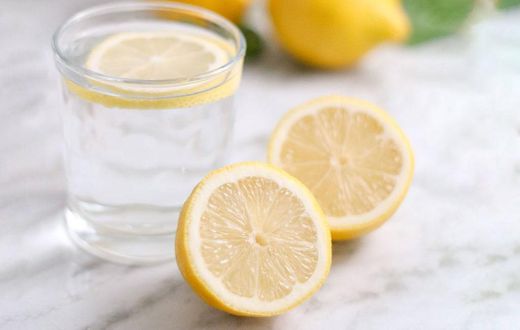 lemon inside a glass of water [fitnessjockey]