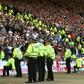 Lines of police separate rival England and Scotland supporters