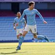 Manchester City defender John Stones celebrates scoring against West Ham