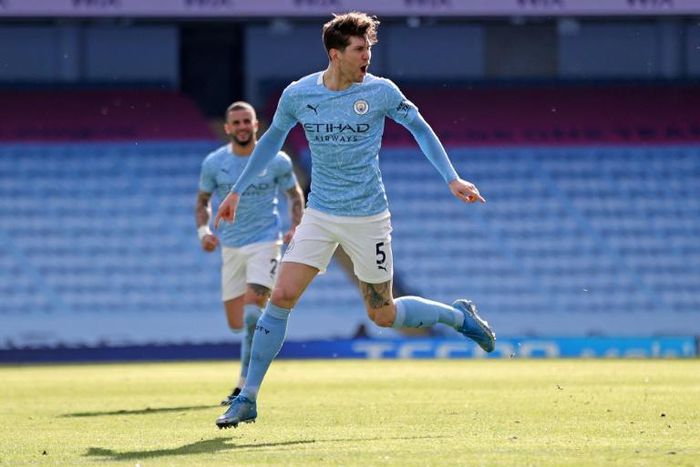 Manchester City defender John Stones celebrates scoring against West Ham