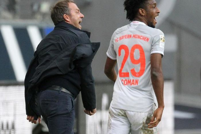 Bayern Munich head coach Hansi Flick (L) is demanding his side bounce back against Lazio after poor recent results