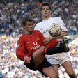 Ole Gunnar Solskjaer in action against Jonathan Woodgate of Leeds as a Manchester United player