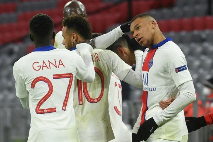 Kylian Mbappe (R) celebrates with his Paris Saint-Germain team-mates after scoring his second goal against Bayern Munich on Wednesday