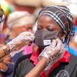 Victoria Michaels donates nose masks to market women