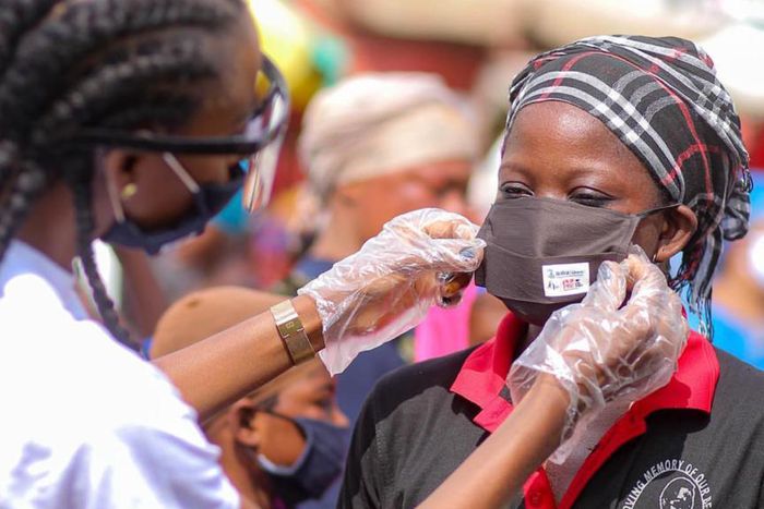 Victoria Michaels donates nose masks to market women