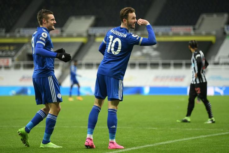 Leicester midfielder James Maddison (C) enjoys a darts-themed celebration