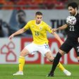 Ilkay Gundogan (R) is set to captain Germany against North Macedonia on Wednesday in a World Cup qualifier