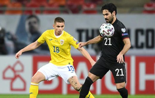 Ilkay Gundogan (R) is set to captain Germany against North Macedonia on Wednesday in a World Cup qualifier