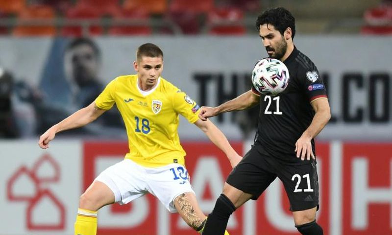 Ilkay Gundogan (R) is set to captain Germany against North Macedonia on Wednesday in a World Cup qualifier