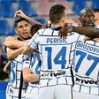 Inter players celebrate after Christian Eriksen put them ahead against Crotone
