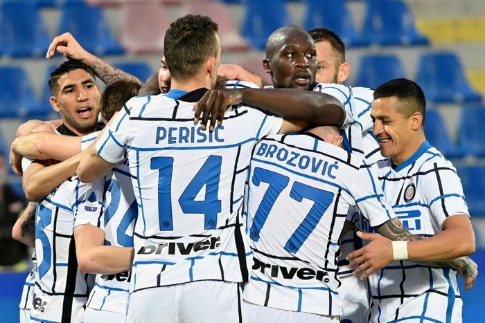 Inter players celebrate after Christian Eriksen put them ahead against Crotone