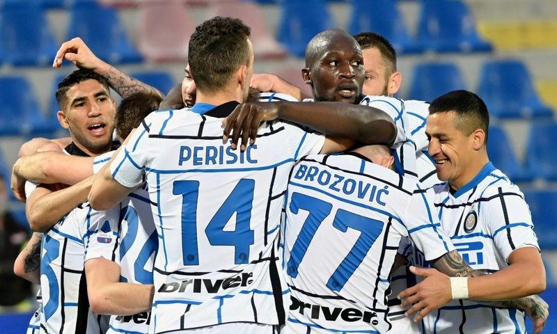 Inter players celebrate after Christian Eriksen put them ahead against Crotone