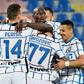 Inter players celebrate after Christian Eriksen put them ahead against Crotone