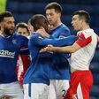 Rangers' Finnish midfielder Glen Kamara, centre, grabbed Slavia Prague Czech defender Ondrej Kudela as the pair clashed in a Europa League tie