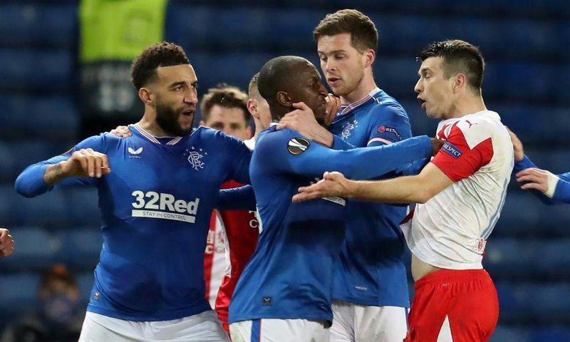 Rangers' Finnish midfielder Glen Kamara, centre, grabbed Slavia Prague Czech defender Ondrej Kudela as the pair clashed in a Europa League tie
