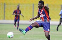 Asamoah Gyan in action for Legon Cities