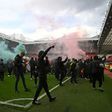 Supporters protest against Manchester United's owners inside Old Trafford