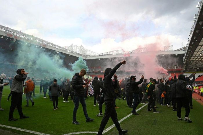 Supporters protest against Manchester United's owners inside Old Trafford