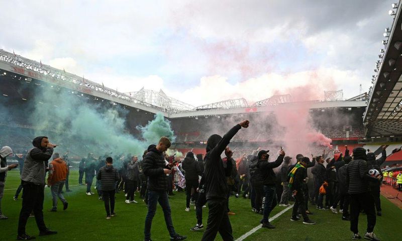 Supporters protest against Manchester United's owners inside Old Trafford