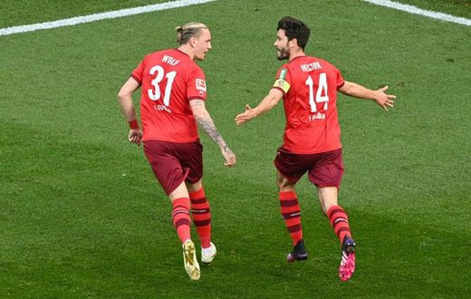 Cologne captain Jonas Hector (R) celebrates scoring the winning goal at home to RB Leipzig