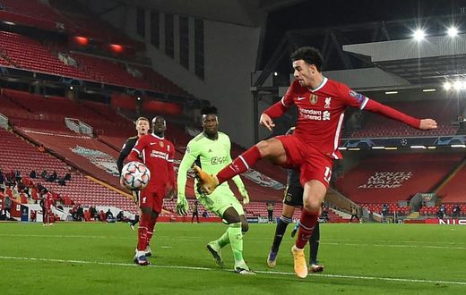 Curtis Jones (right) scored the only goal as Liverpool beat Ajax to reach the Champions League last 16