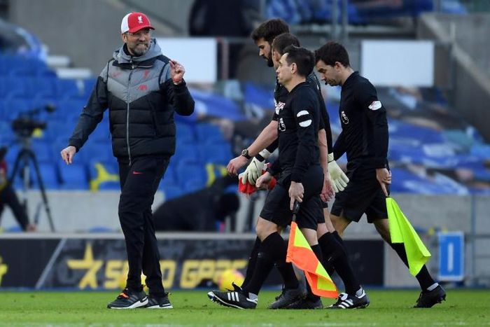 Liverpool boss Jurgen Klopp (left) was left frustrated by dropped points, VAR reviews and another injury after a 1-1 draw at Brighton
