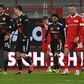 Bayern Munich striker Robert Lewandowski (2nd L) celebrates his equaliser against Union Berlin