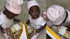 Fella Makafui’s daughter showered with bundles of cash