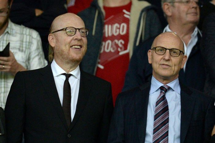 Manchester United co-chairman Joel Glazer (R) with his brother and fellow owner Avram Glazer (L)