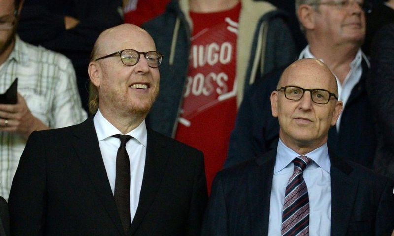 Manchester United co-chairman Joel Glazer (R) with his brother and fellow owner Avram Glazer (L)