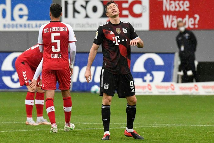 Robert Lewandowski reacts after his miss at Freiburg last Saturday which would have given him a record 41st Bundesliga goal this season