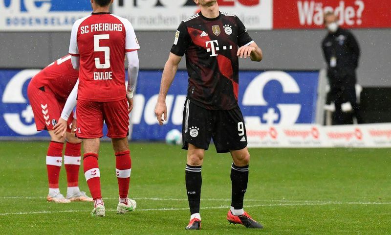 Robert Lewandowski reacts after his miss at Freiburg last Saturday which would have given him a record 41st Bundesliga goal this season