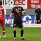 Robert Lewandowski reacts after his miss at Freiburg last Saturday which would have given him a record 41st Bundesliga goal this season