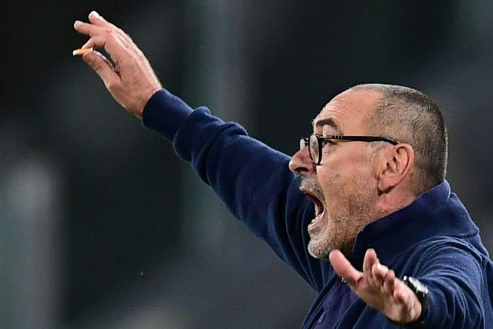 Burning ambition: Maurizio Sarri conducts Juventus  by waving a cigarette butt from the sideline in an Italian Cup semi-final