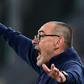 Burning ambition: Maurizio Sarri conducts Juventus  by waving a cigarette butt from the sideline in an Italian Cup semi-final