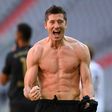 Bayern Munich striker Robert Lewandowski celebrates scoring a record 41st Bundesliga goal this season