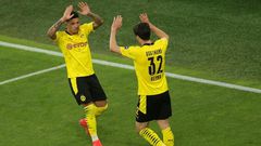 US midfielder Giovanni Reyna (R) and Jadon Sancho celebrate Dortmund's German Cup semi-final rout of Kiel