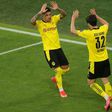 US midfielder Giovanni Reyna (R) and Jadon Sancho celebrate Dortmund's German Cup semi-final rout of Kiel