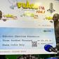 Kwami Sefa Kayi holding the cheque