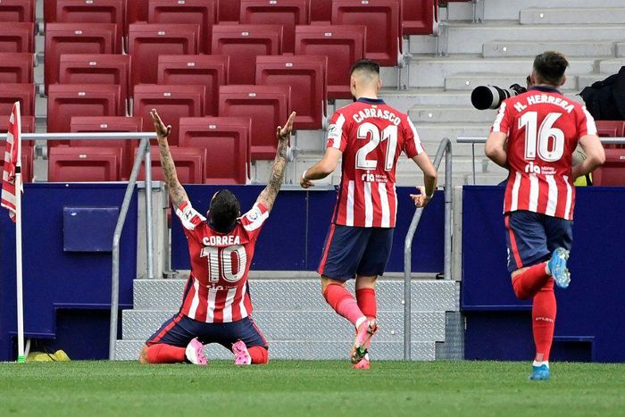Atletico Madrid's Angel Correa celebrates his effort