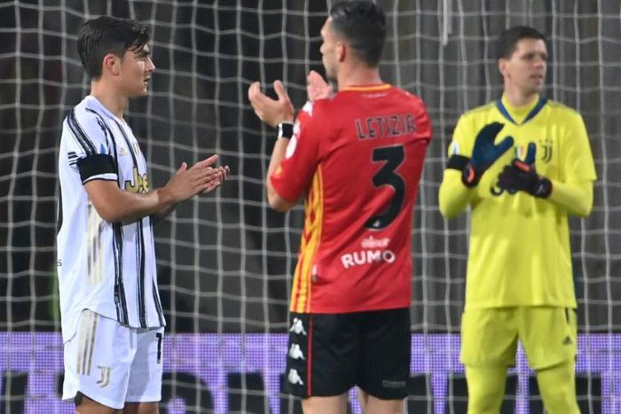 In Benvento, play stopped in the 10th minute as players, including Argentine Juventus striker Paulo Dybala, left, stood and applauded Maradona